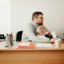 Father on a computer with his son in his lap
