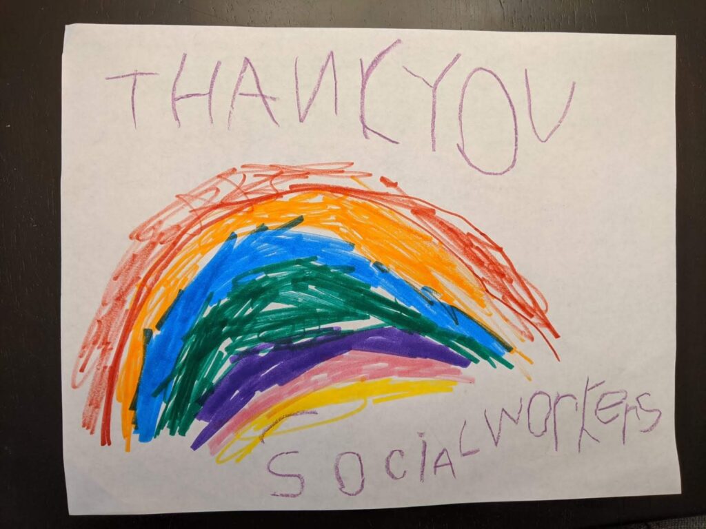 Child's drawing of a rainbow that says 'Thank you Social Workers'