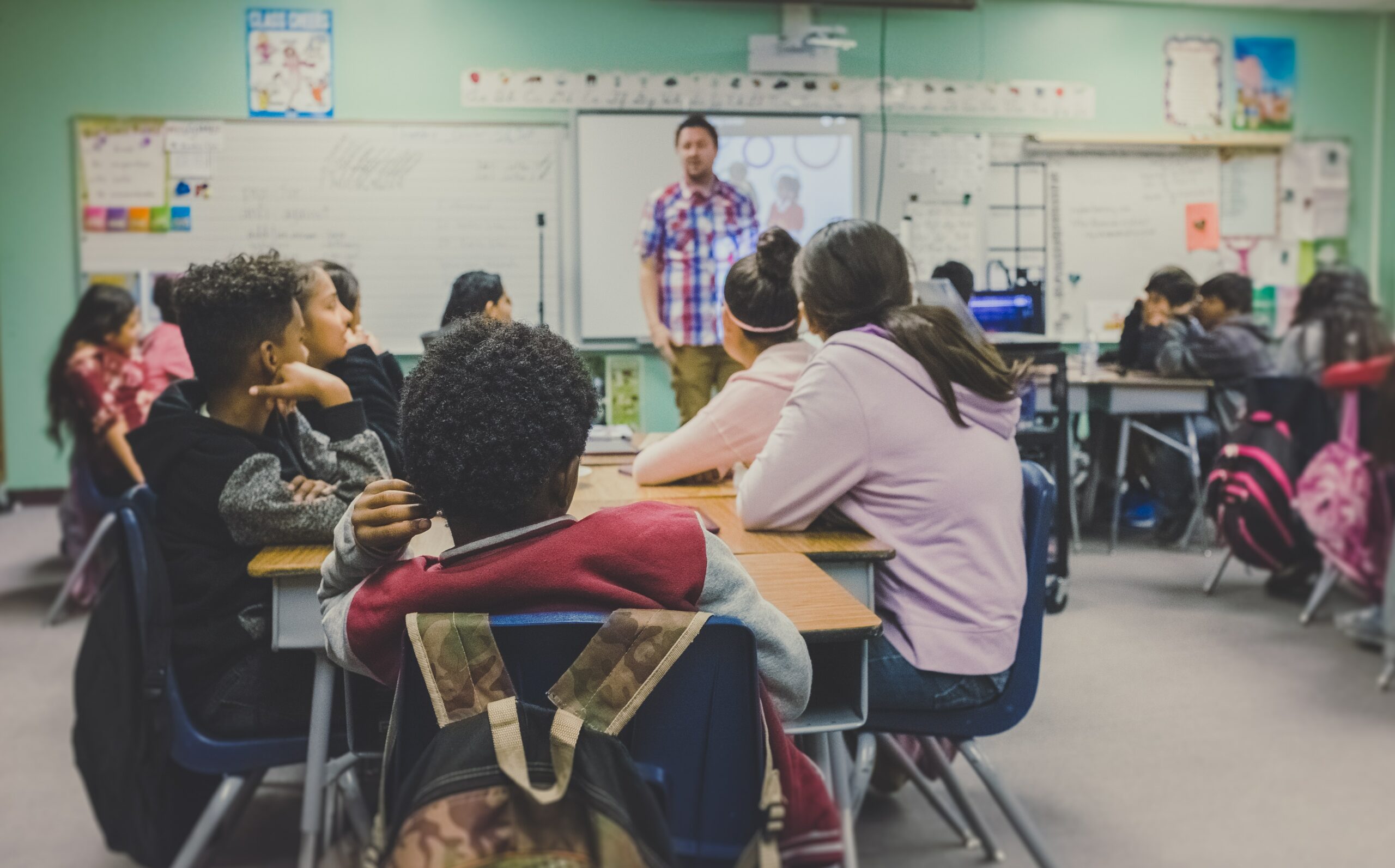 Teacher teaching a school class