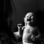 mother holding a crying newborn